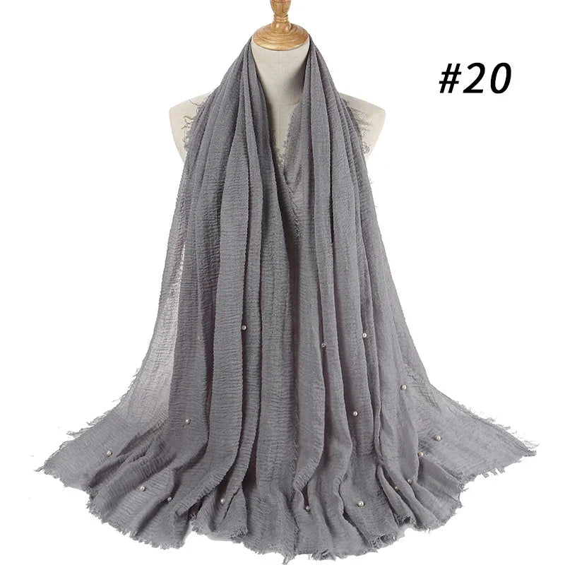 Gray lightweight scarf with pearl embellishments displayed on a dress form, labeled #20