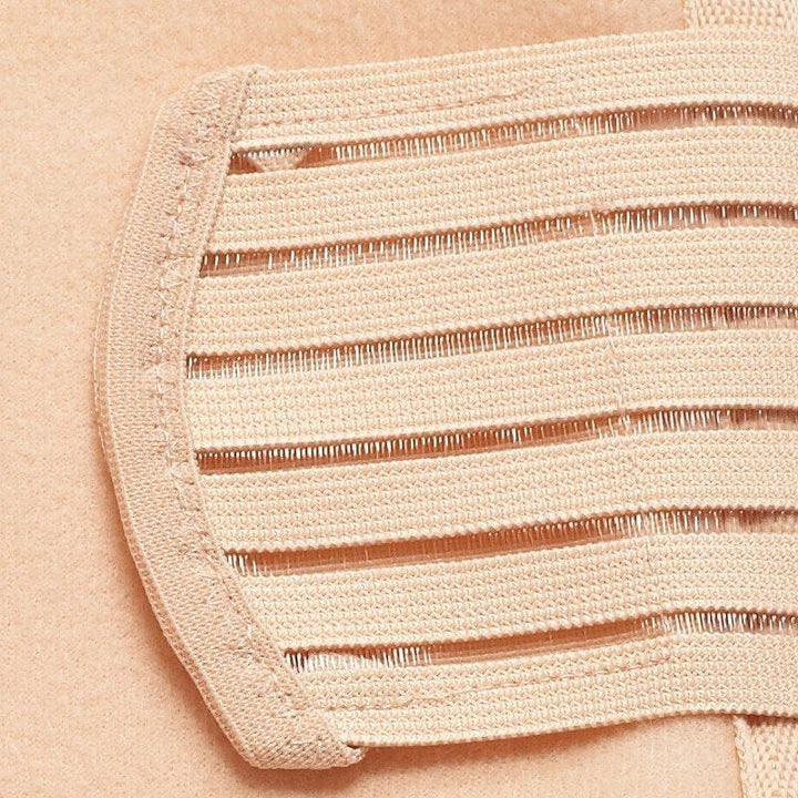 Close-up of beige elastic bandage or support strap with stitched edges on a beige background