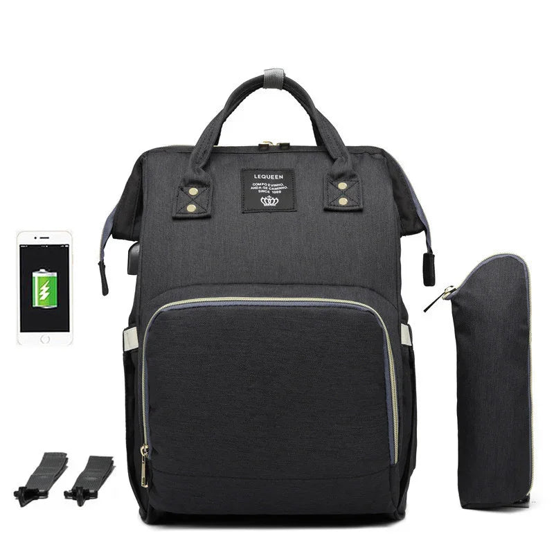 Black LEQUEEN backpack with front zipper pocket, USB charging port, side pouch, and phone showing charging icon