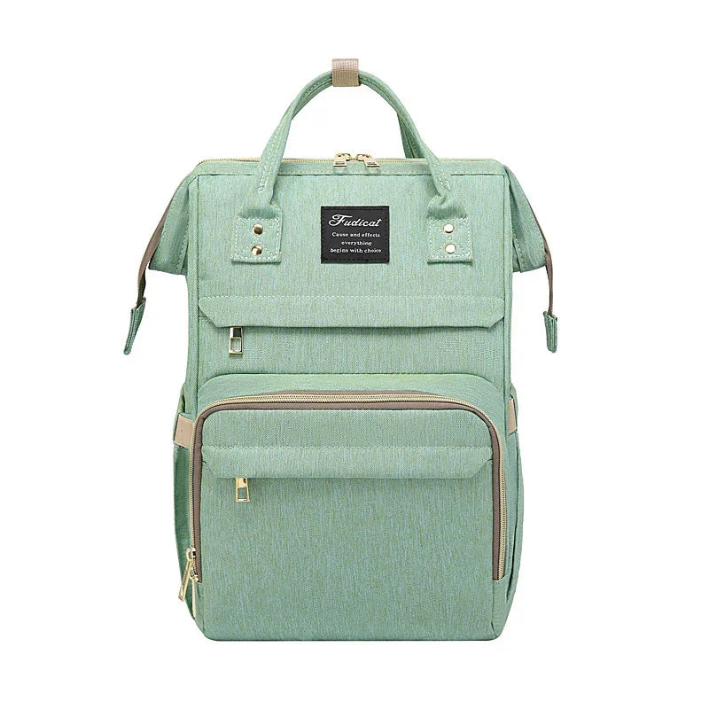 Mint green rectangular backpack with multiple zippered compartments and beige accents