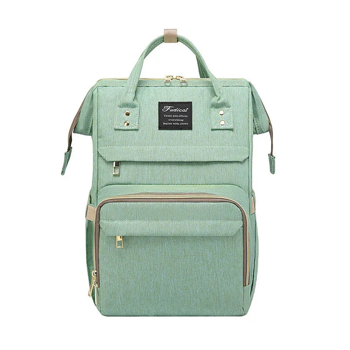 Mint green rectangular backpack with multiple zippered compartments and beige accents