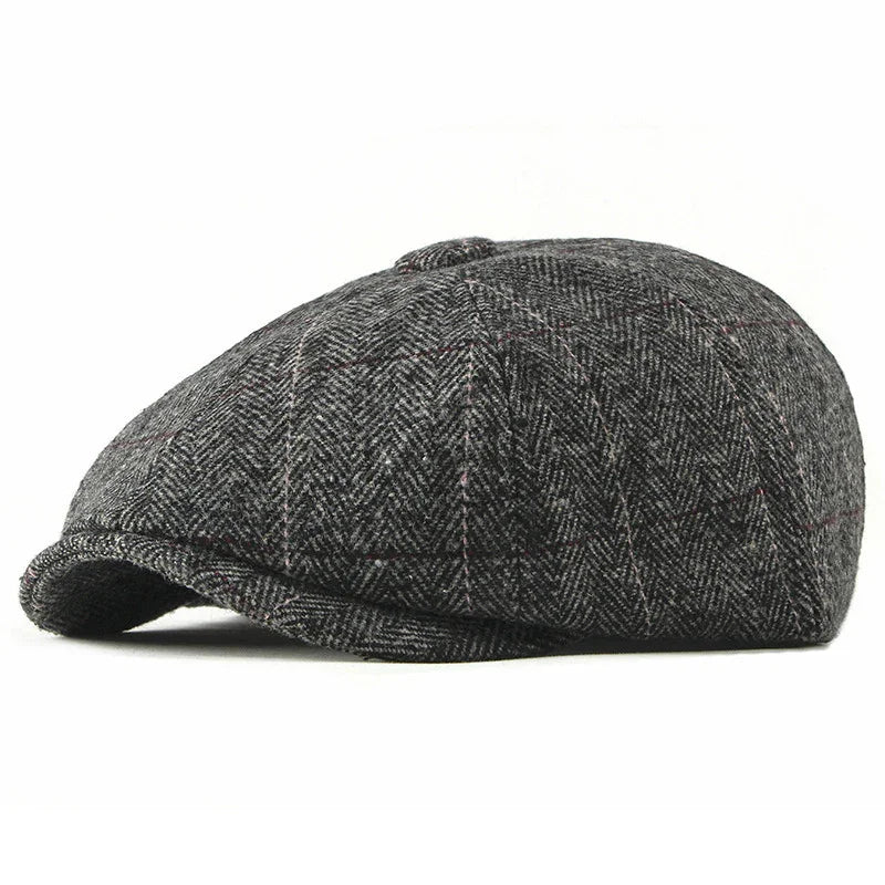 Classic grey tweed newsboy cap with button top and subtle plaid pattern