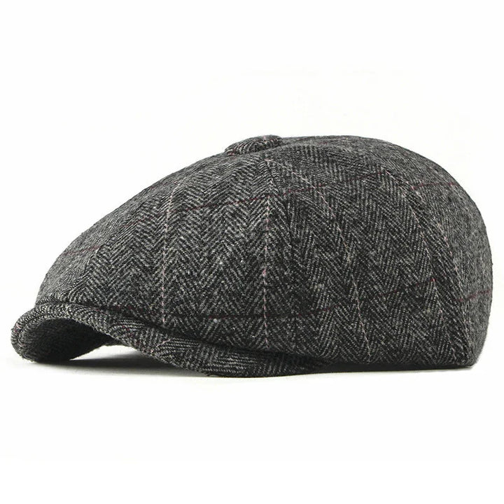 Classic grey tweed newsboy cap with button top and subtle plaid pattern