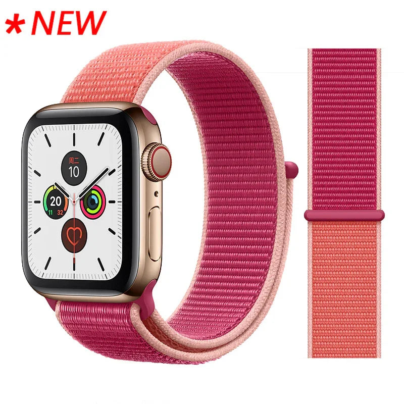 New Apple Watch with pink and red woven nylon sport loop band and activity tracking display