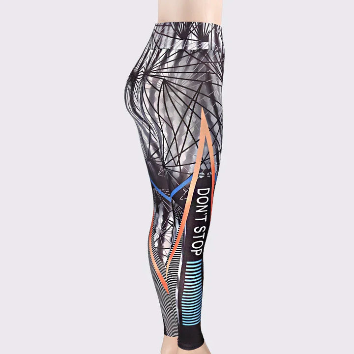 Side view of black and gray patterned leggings with abstract lines and text "DON'T STOP"