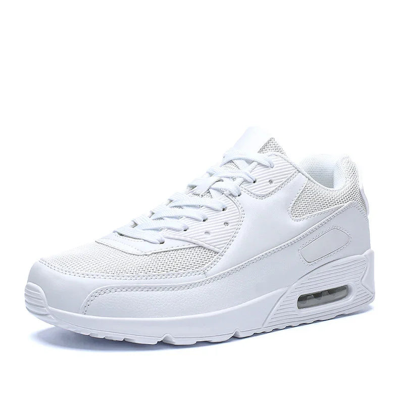 White athletic sneaker with mesh and leather upper, cushioned sole, and visible air cushioning