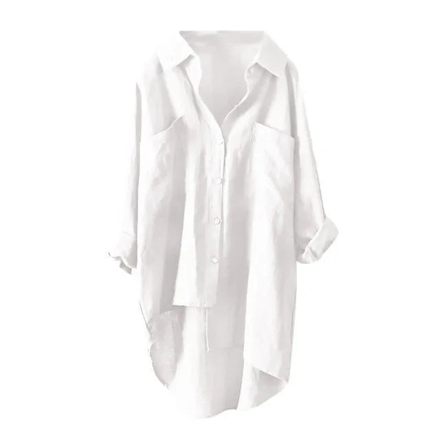White oversized button-up shirt with rolled sleeves and chest pockets on white background