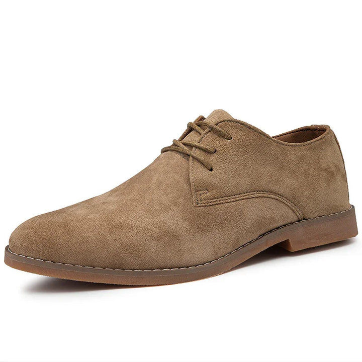 Men's brown suede lace-up dress shoe with low heel and stitched sole