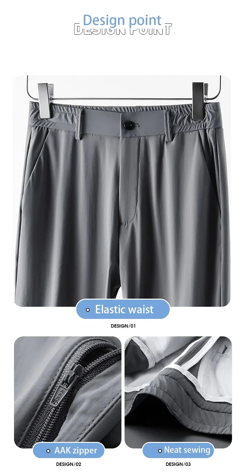 Grey elastic waist pants with AAK zipper and neat sewing details displayed on hanger