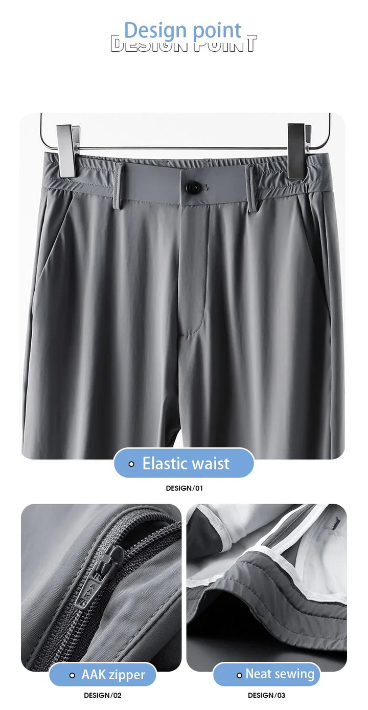 Grey elastic waist pants with AAK zipper and neat sewing details displayed on hanger