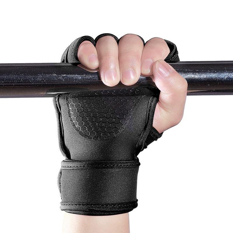 Hand wearing black half-finger workout glove gripping a black metal bar with wrist support