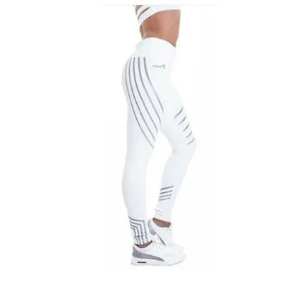 Side view of person wearing white leggings with black stripes and white sneakers, fitness apparel