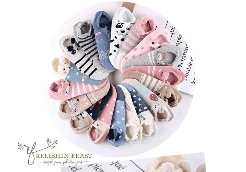 Assorted colorful cartoon animal-themed no-show socks arranged in a circular pattern