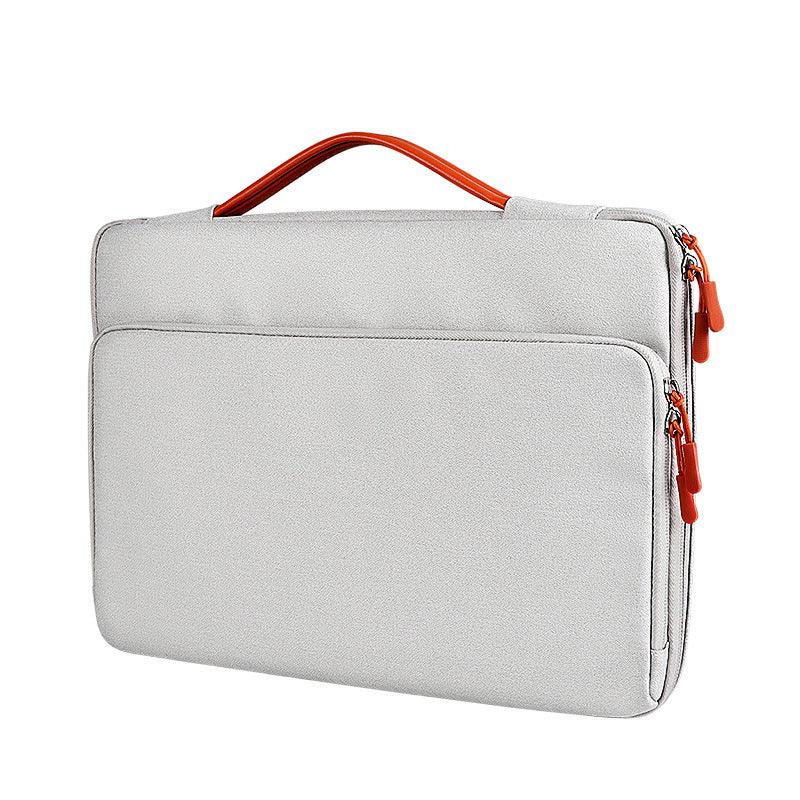 Gray laptop sleeve with orange handle and zipper pulls, slim protective case for laptops