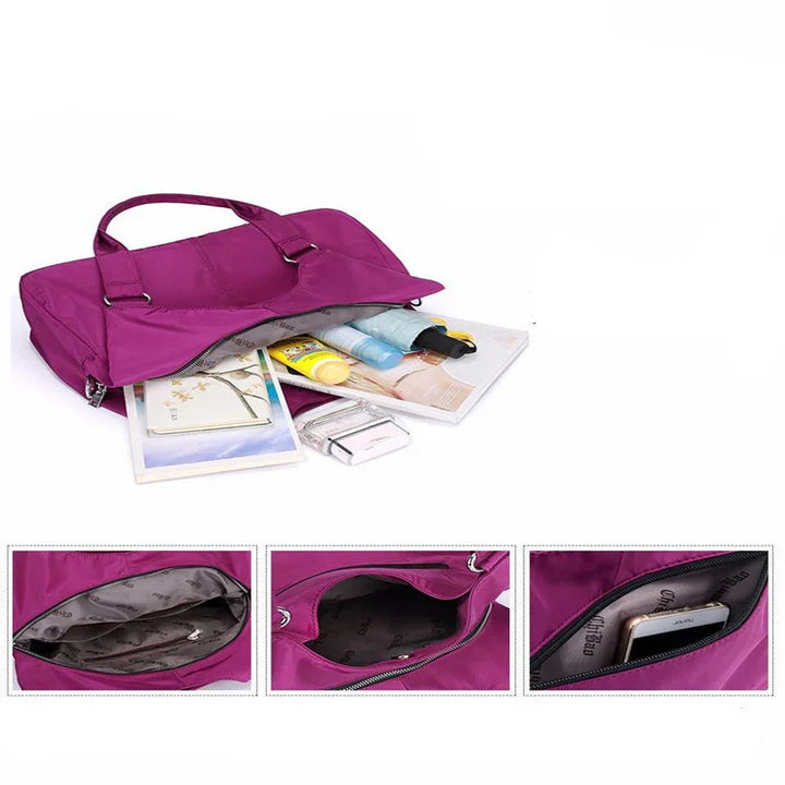 Purple tote bag with zipper, showing organized interior pockets with cosmetics, books, and a smartphone