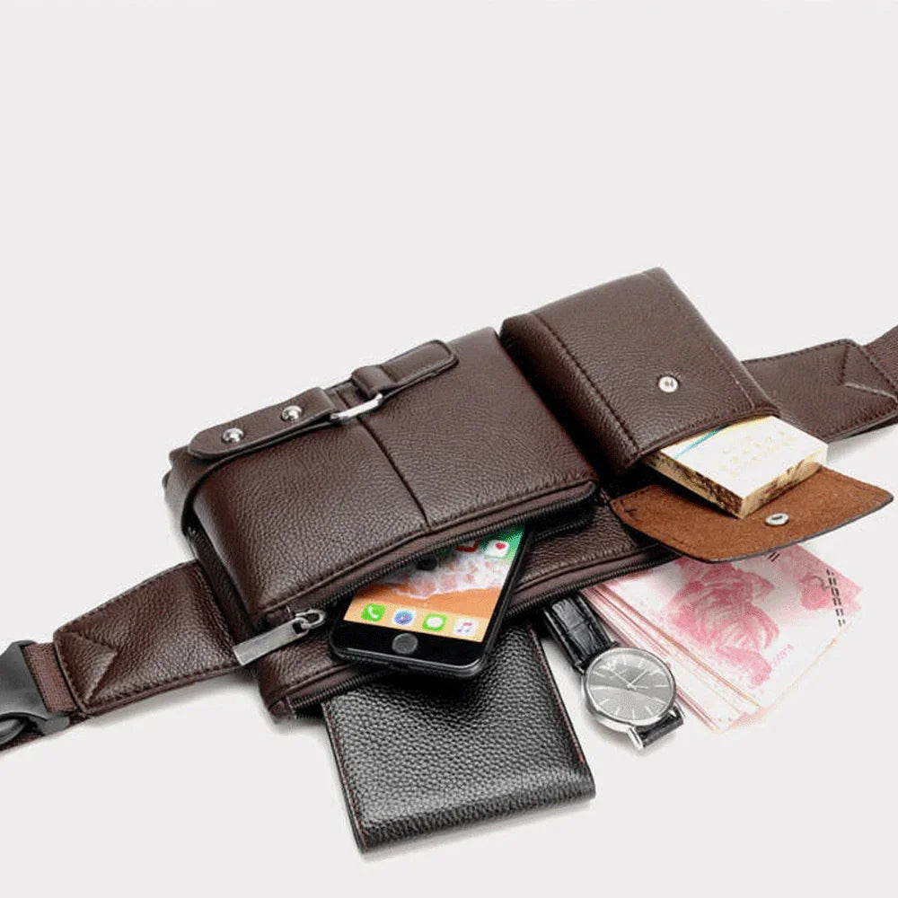 Brown leather waist bag with multiple compartments holding smartphone, wallet, wristwatch, money, and pack of cigarettes