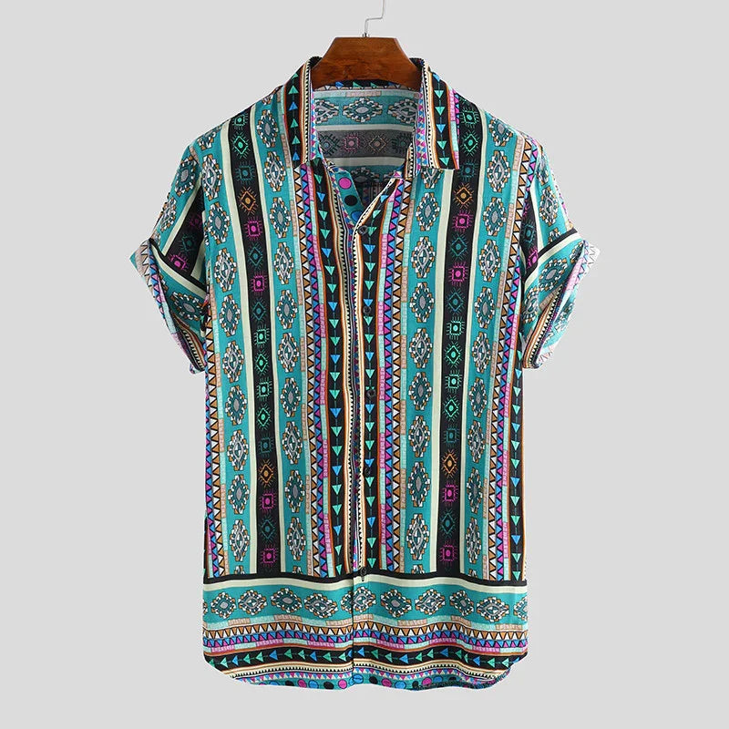 Colorful short-sleeve button-up shirt with geometric tribal patterns on wooden hanger