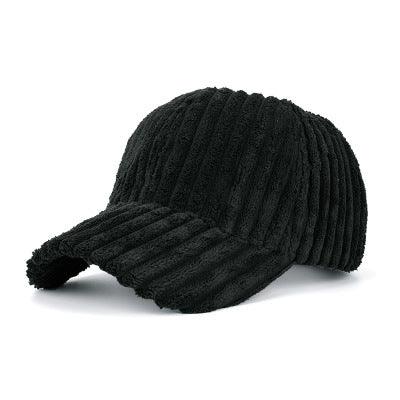 Black corduroy baseball cap with ribbed texture and curved brim on white background