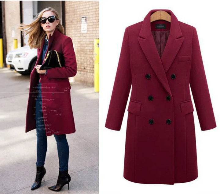 Stylish woman wearing a burgundy double-breasted wool coat with black buttons and pointed black ankle boots