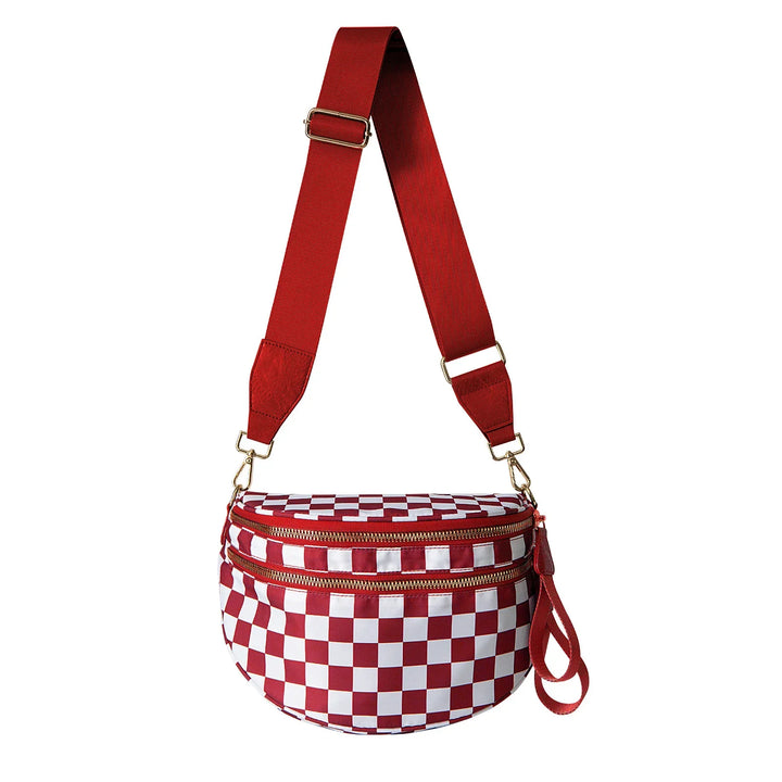 Red and white checkered crossbody bag with adjustable strap and gold zipper