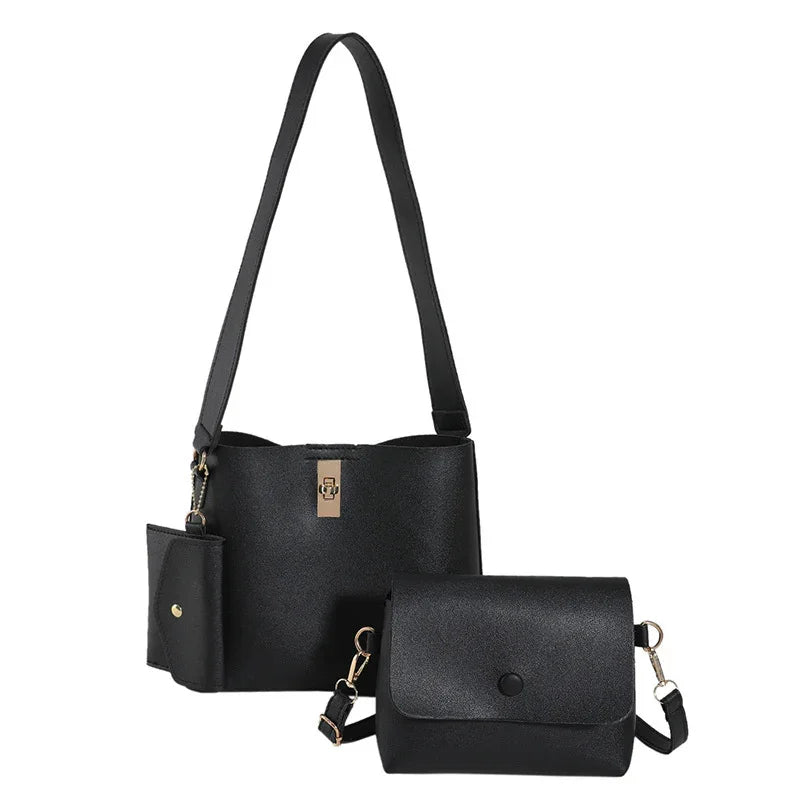 Set of two black leather bags with gold hardware, including a shoulder bag and a crossbody bag