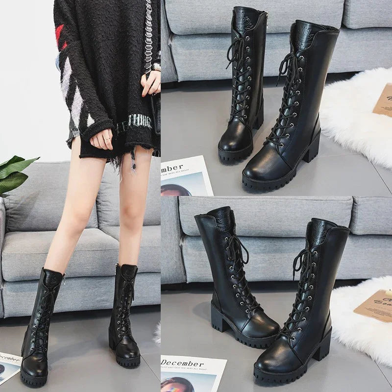 Black leather lace-up combat boots with chunky heels worn by model in casual indoor setting