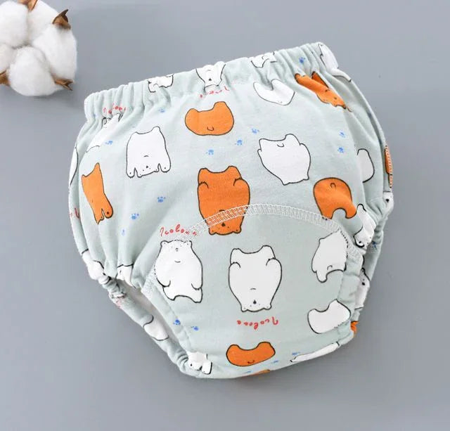 Light blue baby training pants with cute orange and white bear prints and cotton on side