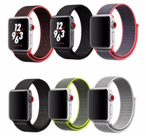Six smartwatches with woven sport loop bands in black red, black, gray red, black, black yellow, and gray colors on white background