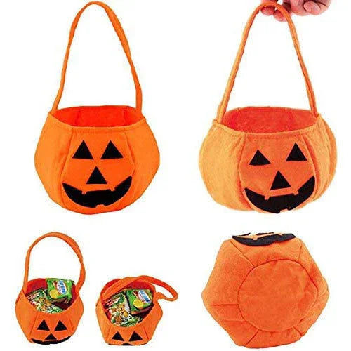 Orange plush Halloween candy bucket shaped like a smiling jack-o'-lantern with a handle