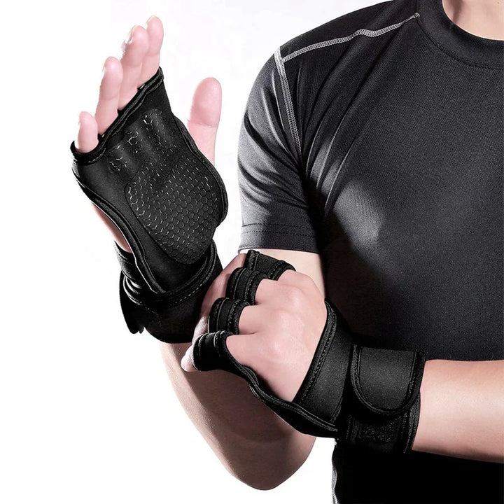 Person wearing black fingerless workout gloves with wrist support and black athletic shirt
