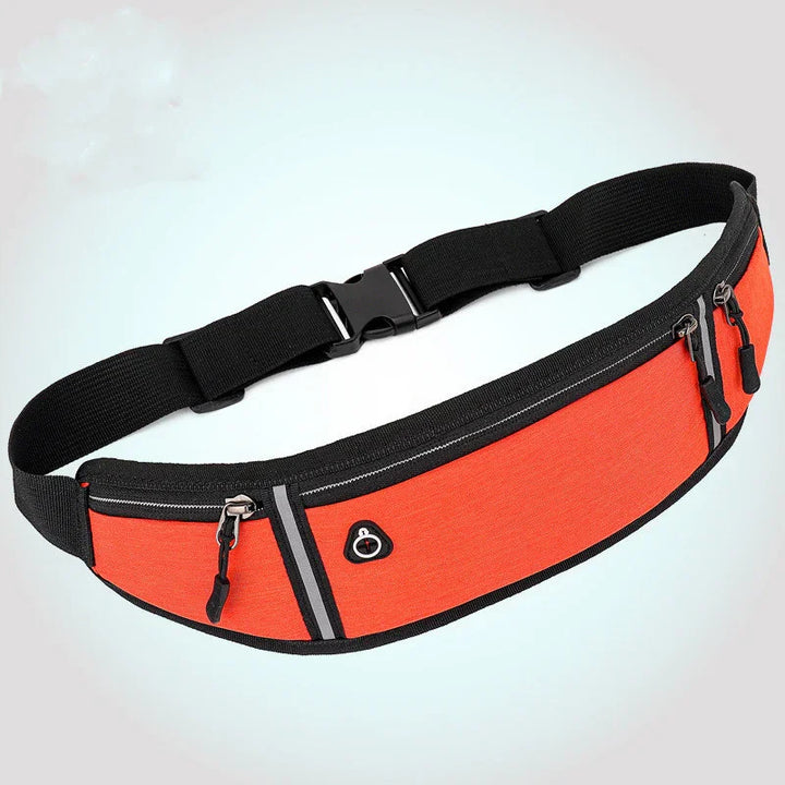 Orange and black waist pack with multiple zippered compartments and adjustable black strap