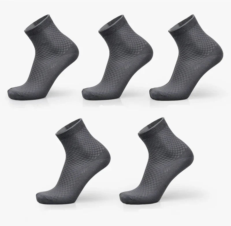Set of five dark gray ankle socks with textured pattern displayed on white background