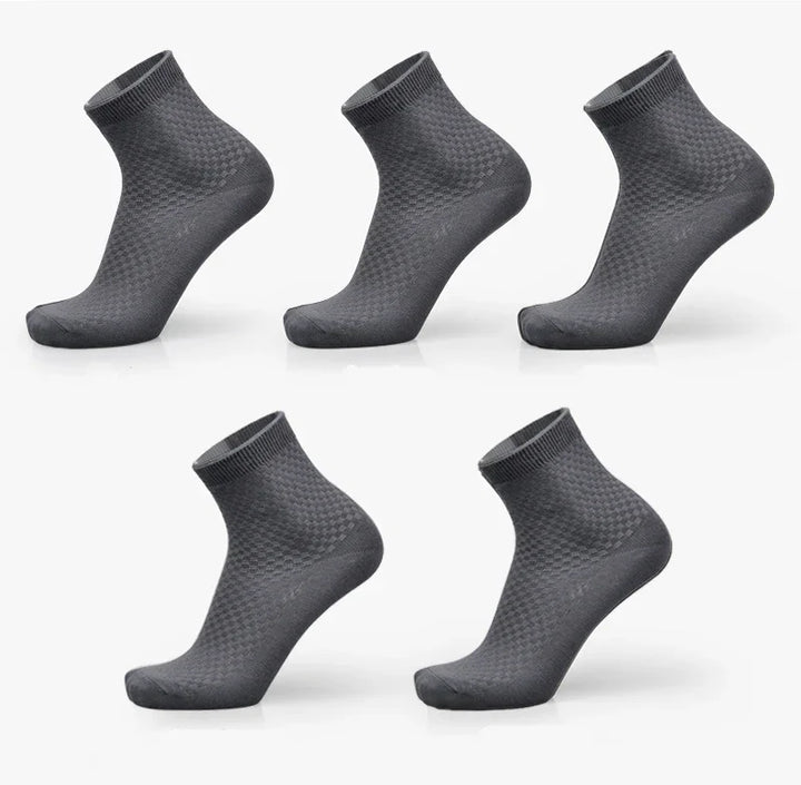 Set of five dark gray ankle socks with textured pattern displayed on white background