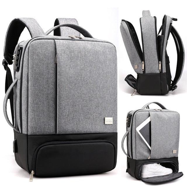 Gray and black anti-theft laptop backpack with multiple compartments and shoe storage pocket