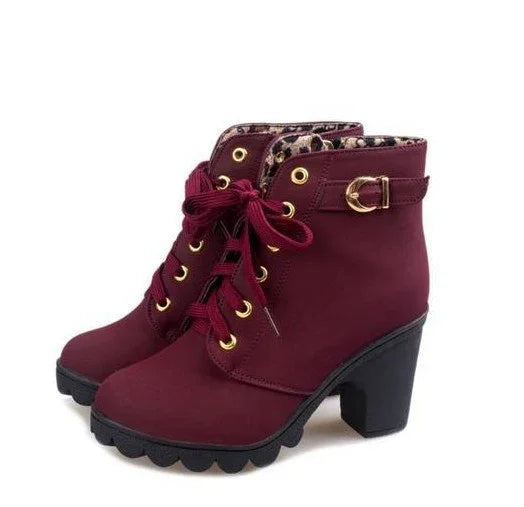 Burgundy women's ankle boots with chunky heels, gold eyelets, leopard print inner lining, and side buckle detail