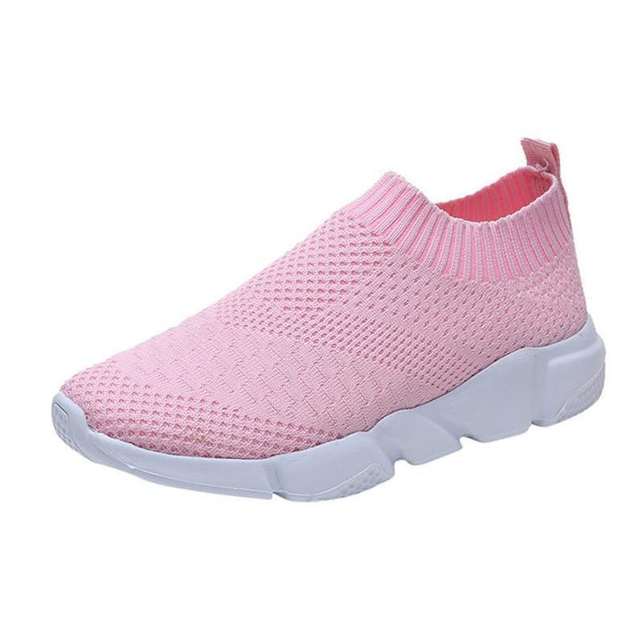 Light pink slip-on knitted sneaker with white thick sole, breathable and flexible design