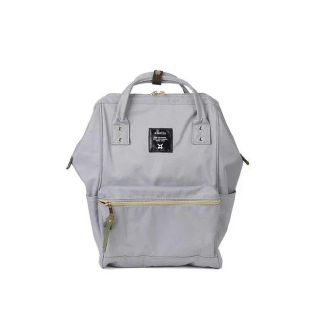 light gray Anello backpack with front zip pocket and dual top handles