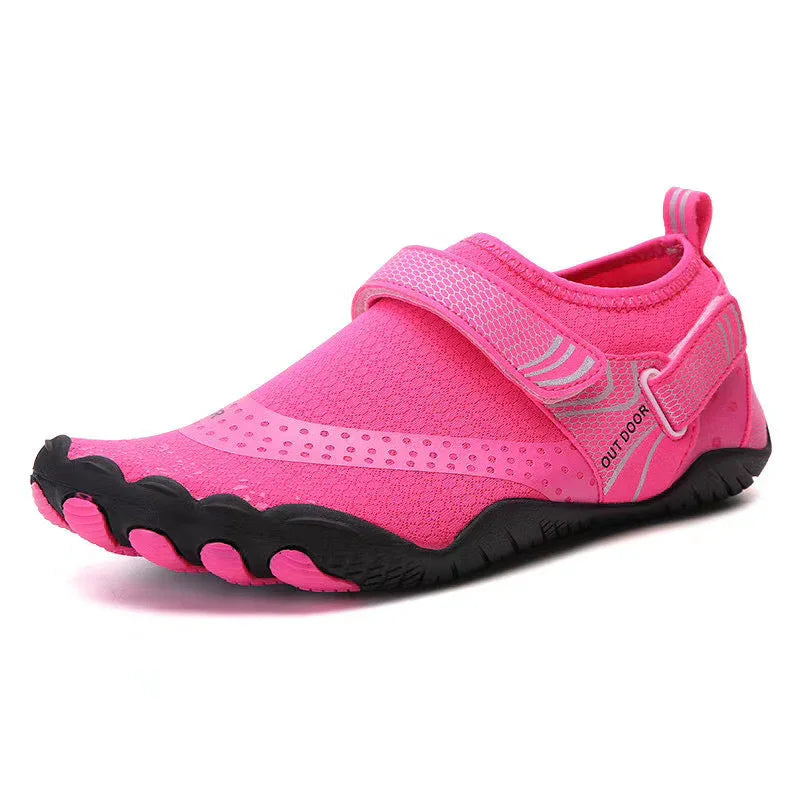 Pink outdoor water shoes with breathable mesh upper and black textured sole