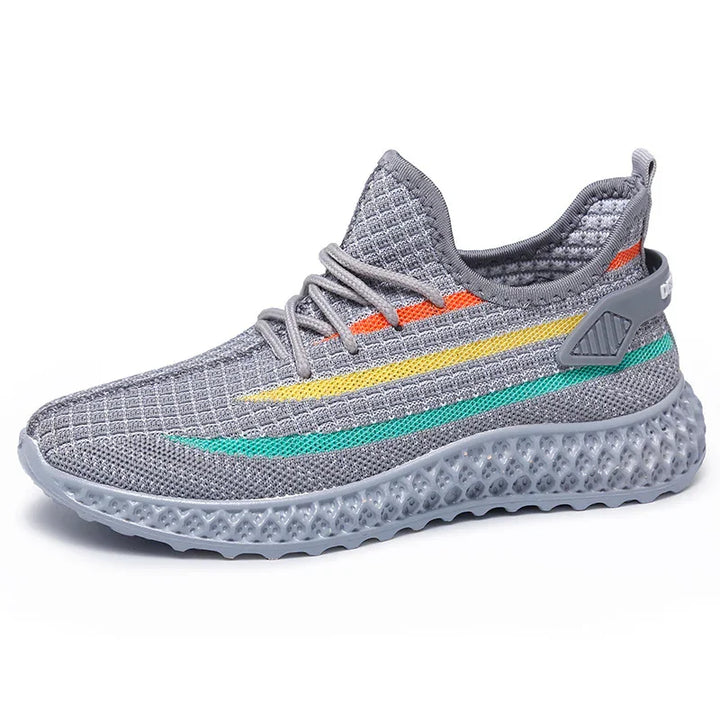 Gray knit athletic sneaker with orange, yellow, and green stripes and textured sole