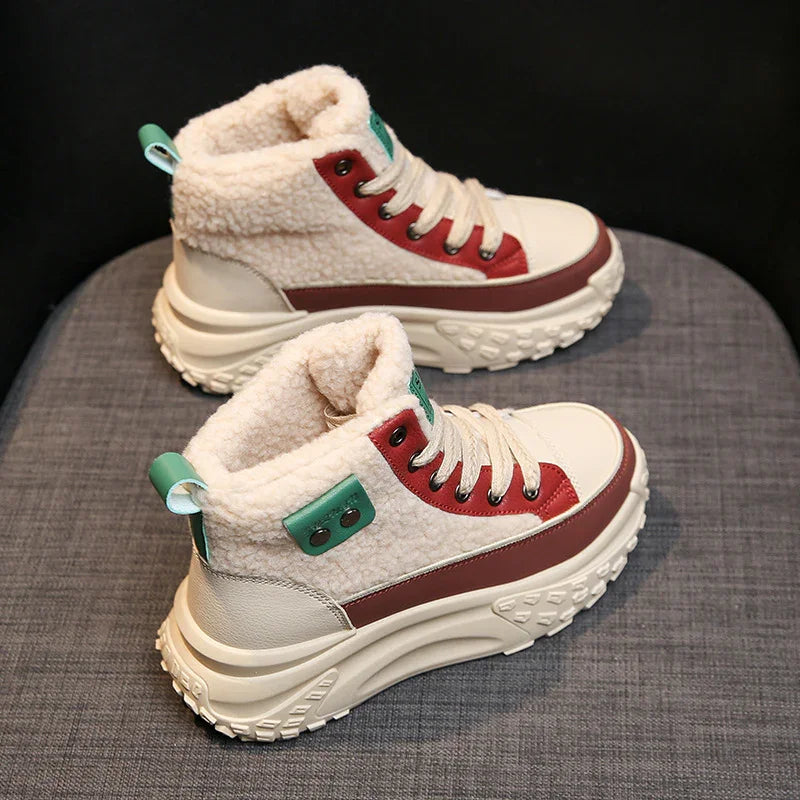 Chunky platform winter sneakers with cream fleece lining, red and green accents on gray fabric