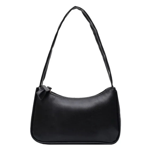 Sleek black leather shoulder bag with curved silhouette and thin adjustable strap