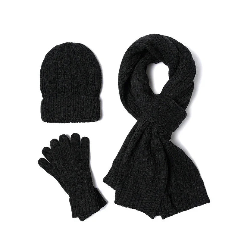 Black knitted winter set including beanie hat, scarf, and gloves with cable knit pattern