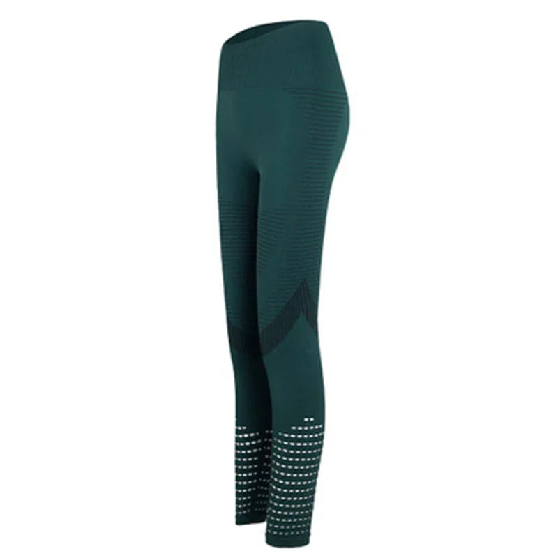 Dark teal seamless high-waisted leggings with textured patterns and dot details on calves