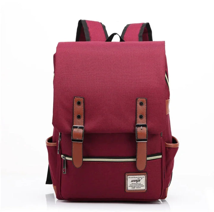 Stylish burgundy backpack with brown leather straps, front zipper pocket, and side pouches for casual use