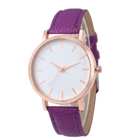 Rose gold wristwatch with minimalist white dial and purple leather strap