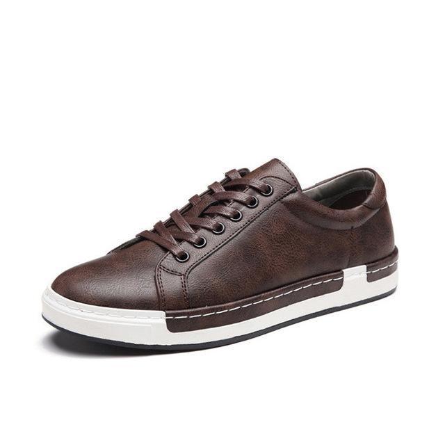 brown leather casual sneaker with white and black rubber sole and lace-up design