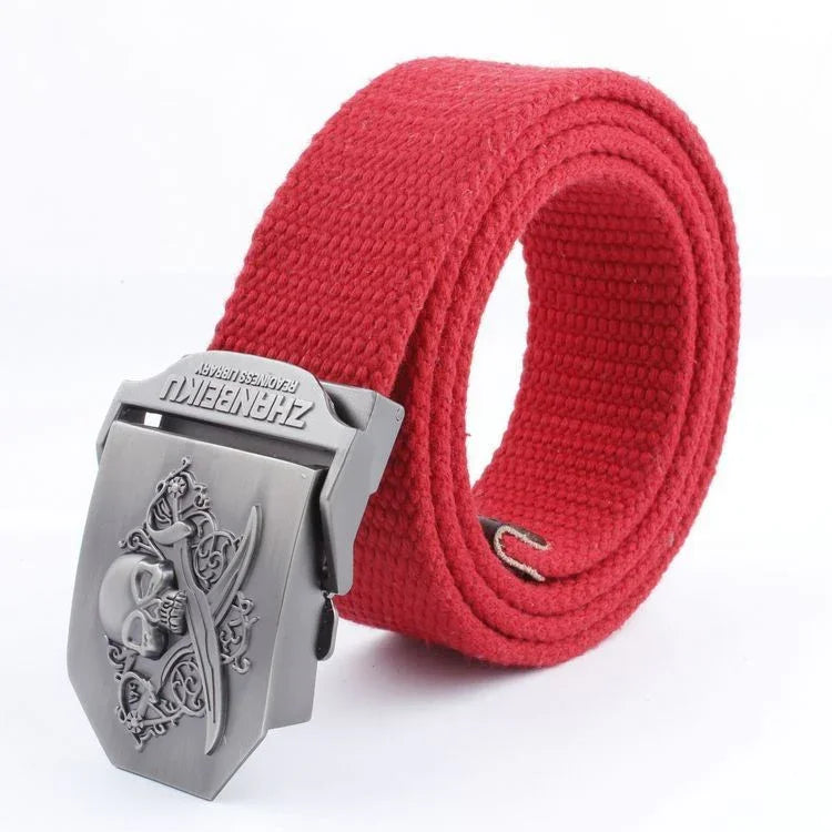 Red woven fabric belt with silver metal buckle featuring skull and crossed swords design