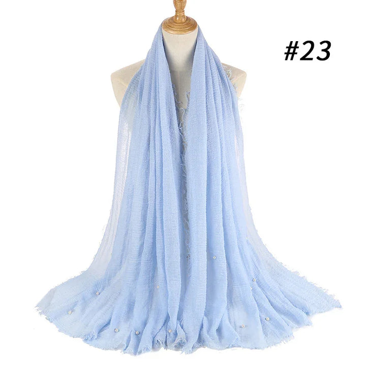 Light blue sheer scarf with pearl accents displayed on a mannequin, labeled #23