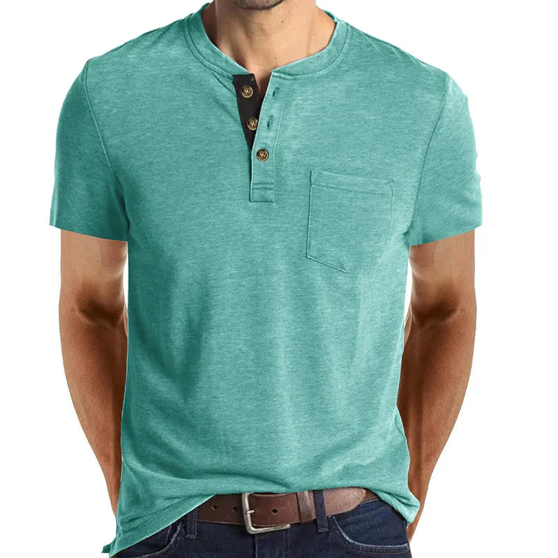 Men's casual teal henley t-shirt with front pocket and button placket, paired with jeans and brown belt