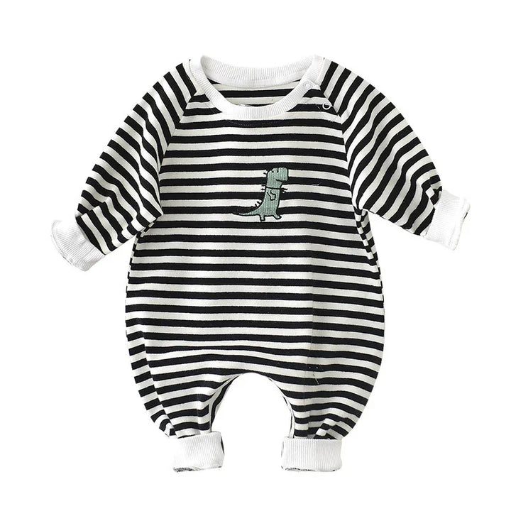 Black and white striped baby romper with green dinosaur embroidery and snap shoulder detail